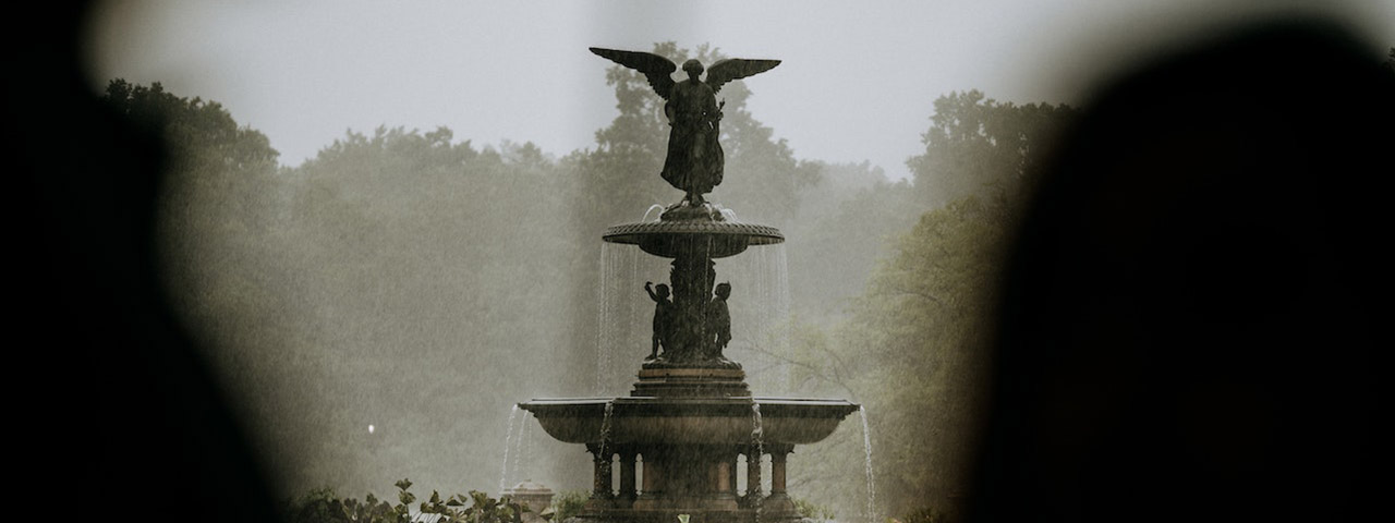 old fountain near a forest