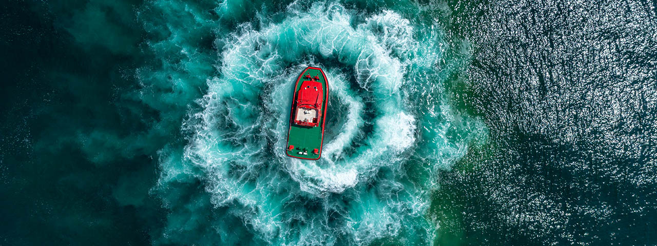 Top View Photo of Boat on Ocean