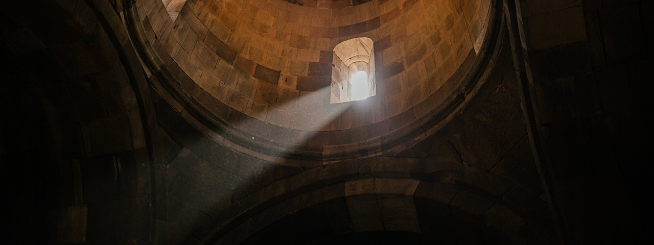 Old domed ceiling with sunlight shining through window